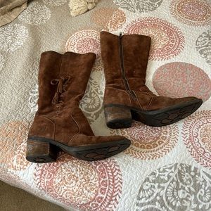 Born brown tobacco rust distressed tall boot. Tassel detail